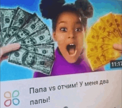 a little girl is holding a bunch of money and a piece of cheese .