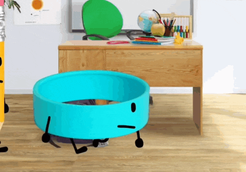 a blue circle with a face is sitting on a wooden floor next to a pencil and a desk