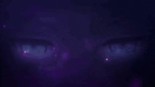 a close up of a person 's eyes with a purple background .