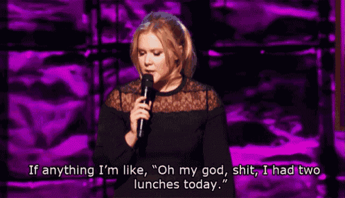 a woman speaking into a microphone with the words if anything i 'm like