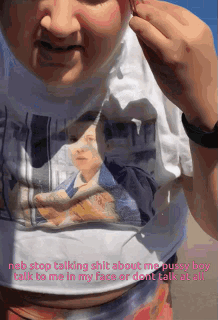 a woman wearing a t-shirt with a picture of a woman on it