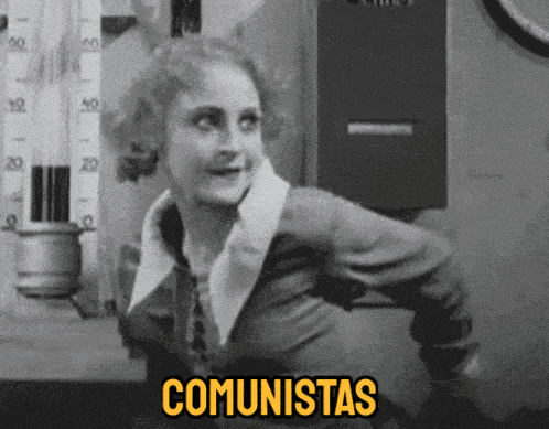 a black and white photo of a woman with the word comunistas written in yellow