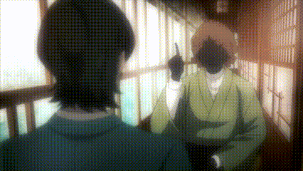 a man in a green kimono is standing next to another man in a blue shirt