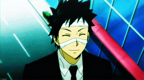 a man in a suit and tie with a bandage on his head