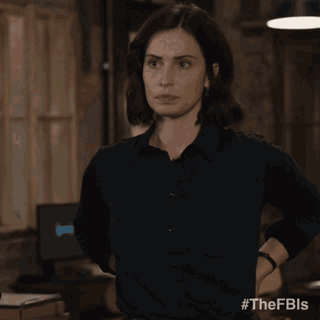 a woman in a black shirt has the hashtag #thefbls on the bottom