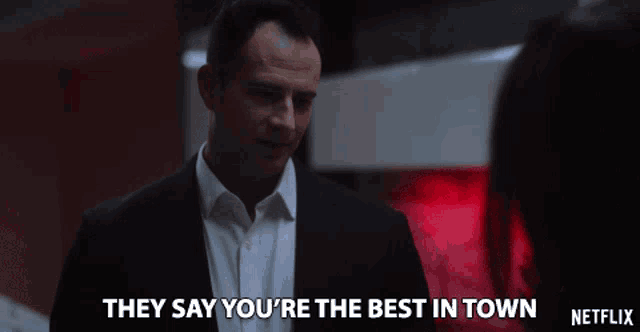 a man in a suit and white shirt says they say you are the best in town