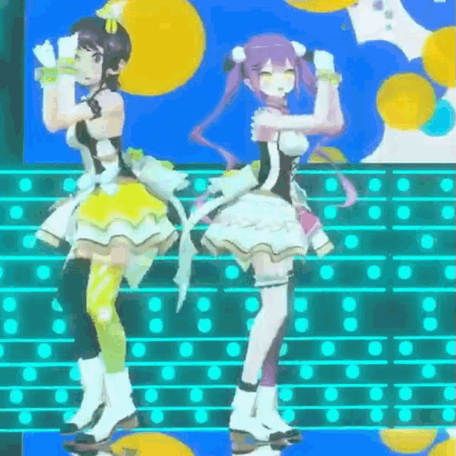 two anime girls are dancing on a stage in front of a crowd .