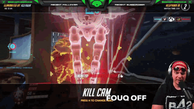 a man wearing headphones is playing a video game and the screen says kill cam