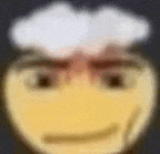 a blurry picture of a yellow smiley face with a white cloud on top of it .