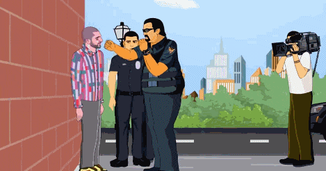 two police officers are talking to a man while a cameraman is taking a picture