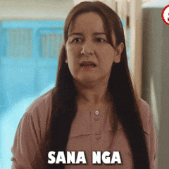a woman with long hair says sana nga