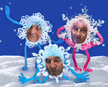 a group of people with snowflakes on their faces