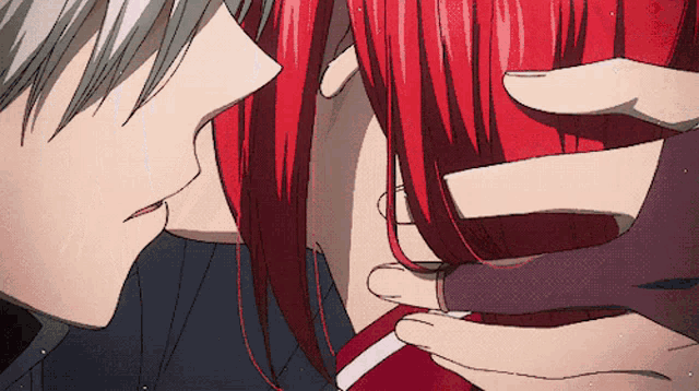 a close up of a person 's face with red hair