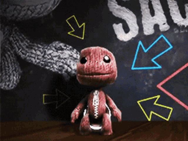a stuffed animal is standing in front of a chalkboard that says " save "