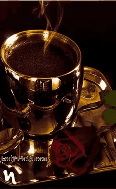 a cup of coffee is on a saucer next to a rose and says lady mcqueen