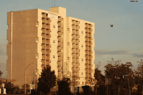 a large white building with a sign that says " lifetime " on it