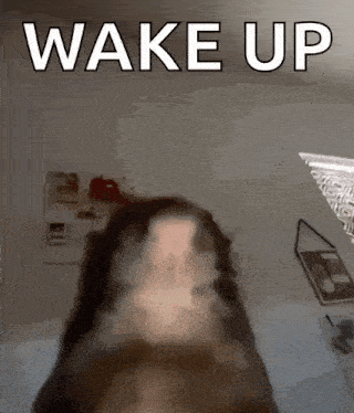 a picture of a dog with the words wake up written on it