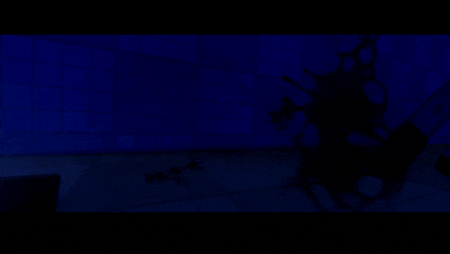 a person in a blue suit is walking down a dark alley