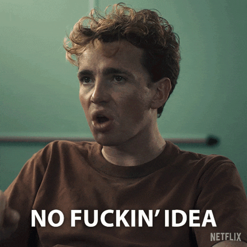 a man says no fuckin ' idea in front of a green wall