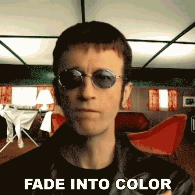 Fade Into Color Robin Gibb GIF - Fade Into Color Robin Gibb Bee Gees GIFs