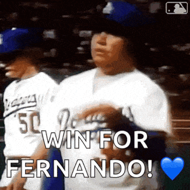 a baseball player says win for fernando with a heart in the background