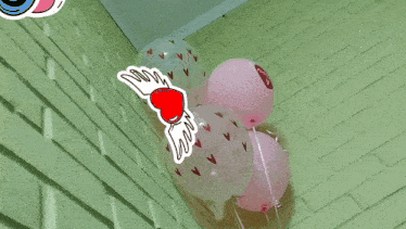 a bunch of pink and white balloons with hearts and wings