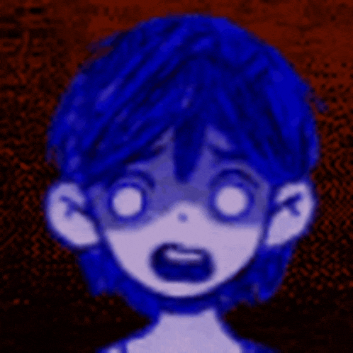 a close up of a person 's face with blue hair .