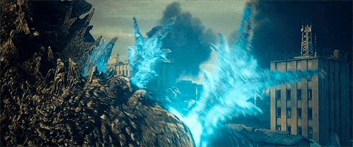 a monster is standing in front of a building with a blue light coming from it