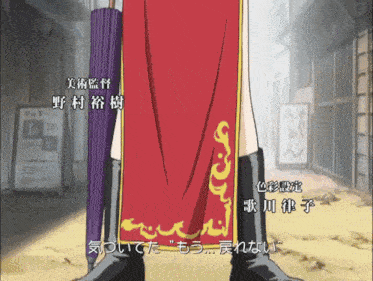 a woman in a red and gold dress holding an umbrella