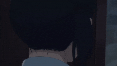 a boy and a girl are looking at each other with their eyes closed