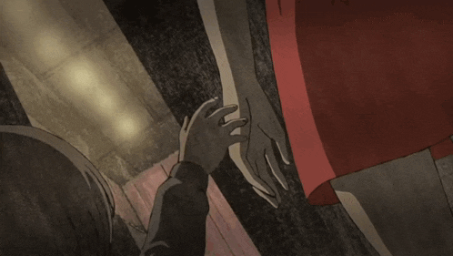 a woman in a red dress holds the hand of a boy