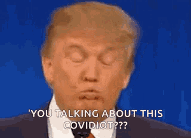 a close up of donald trump making a funny face while talking about covidiot .