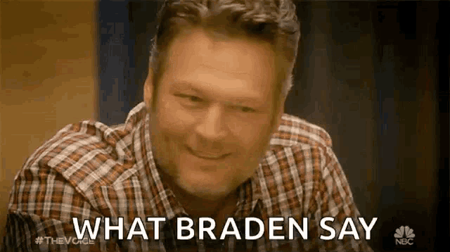 a man in a plaid shirt is smiling and asking what braden say .