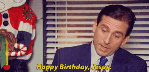 a man in a suit and tie is saying happy birthday jesus .
