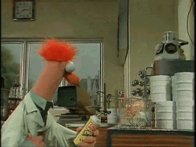 a cartoon character is holding a can of lysol spray