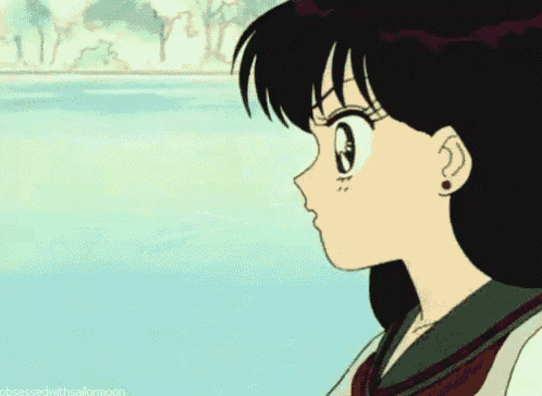 a close up of a girl 's face with the words obsessed with sailormoon below her