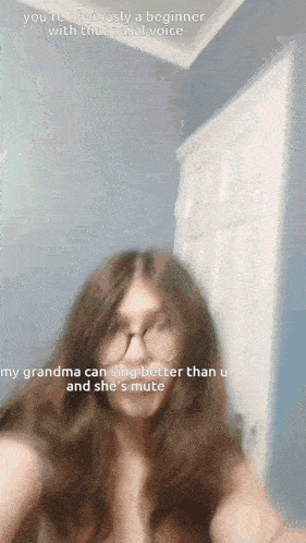 a woman taking a selfie with a caption that says " you 're obviously a beginner with that vocal voice