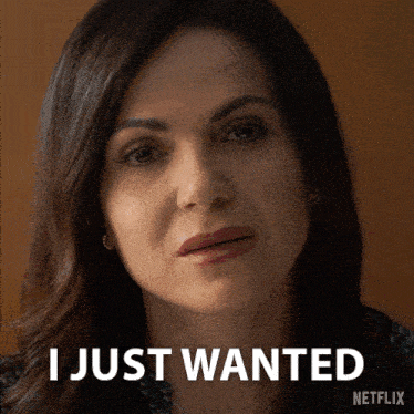 a woman says i just wanted in front of a brown background