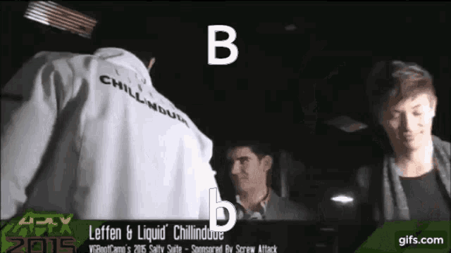 a man with the letter b on his shirt