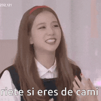 a woman with long hair is smiling with the words riete si eres de cami written below her