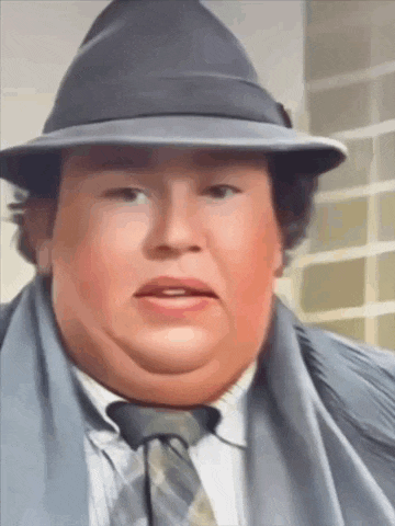 a fat man wearing a hat and tie is making a face
