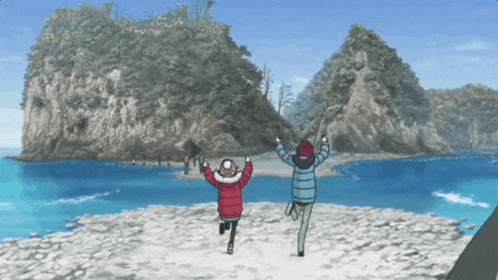 two people jumping in the air in front of a body of water with mountains in the background