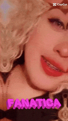 a close up of a woman 's face with the word fanatica on the bottom