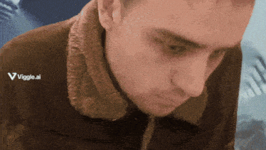a close up of a man 's face with the words viggle.ai visible