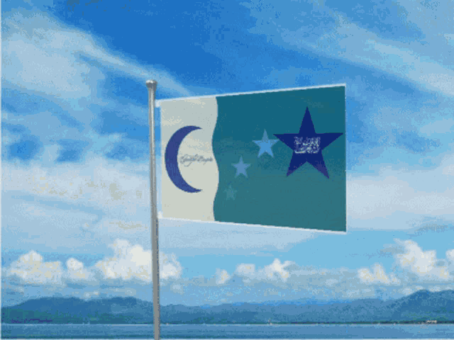 a flag with a crescent moon and three stars