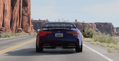 a blue car with a california license plate that says aln899