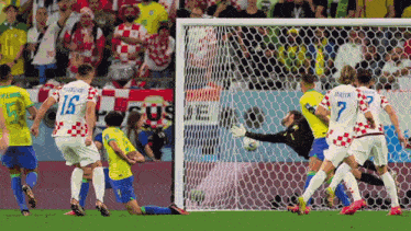 a soccer player with the number 7 on his back kicks the ball