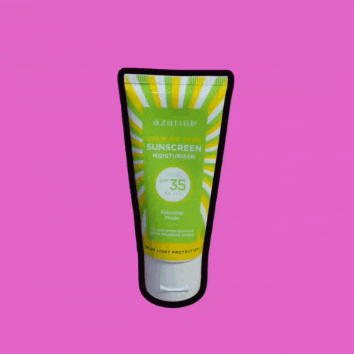 a tube of azaume calm my acne sunscreen moisturizer against a pink background
