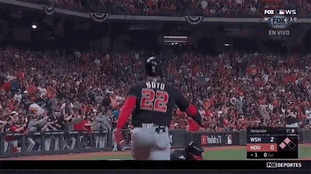 a baseball player with the number 22 on the back of his shirt