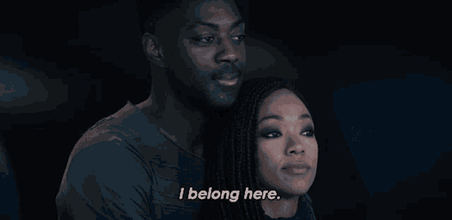 a man and a woman are hugging and the man says " i belong here "